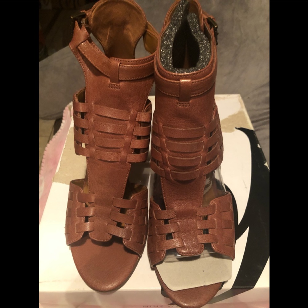 Brand new NW Kurrious Sandals. Wooden heels approx 3.5/4” cognac. Never worn.